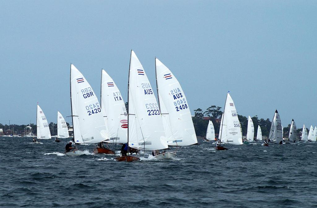 Contender Worlds 2014 Jono Neate leads fleet downwind © Jantine Vogel
